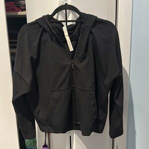 Lululemon black zip up. Size 8. Great condition. Gently used.